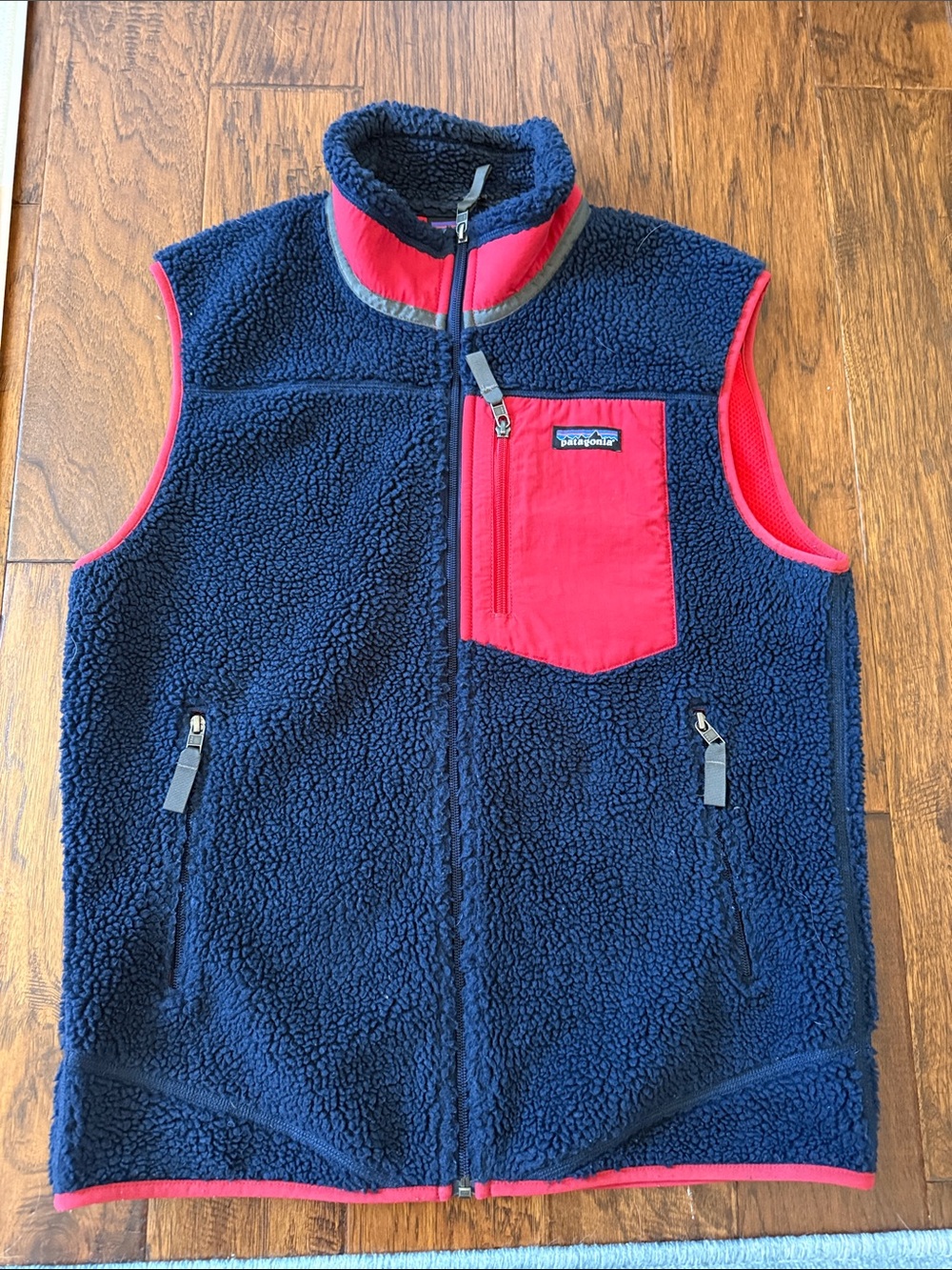 Patagonia Navy Fleece Vest with Red Chest Pocket M